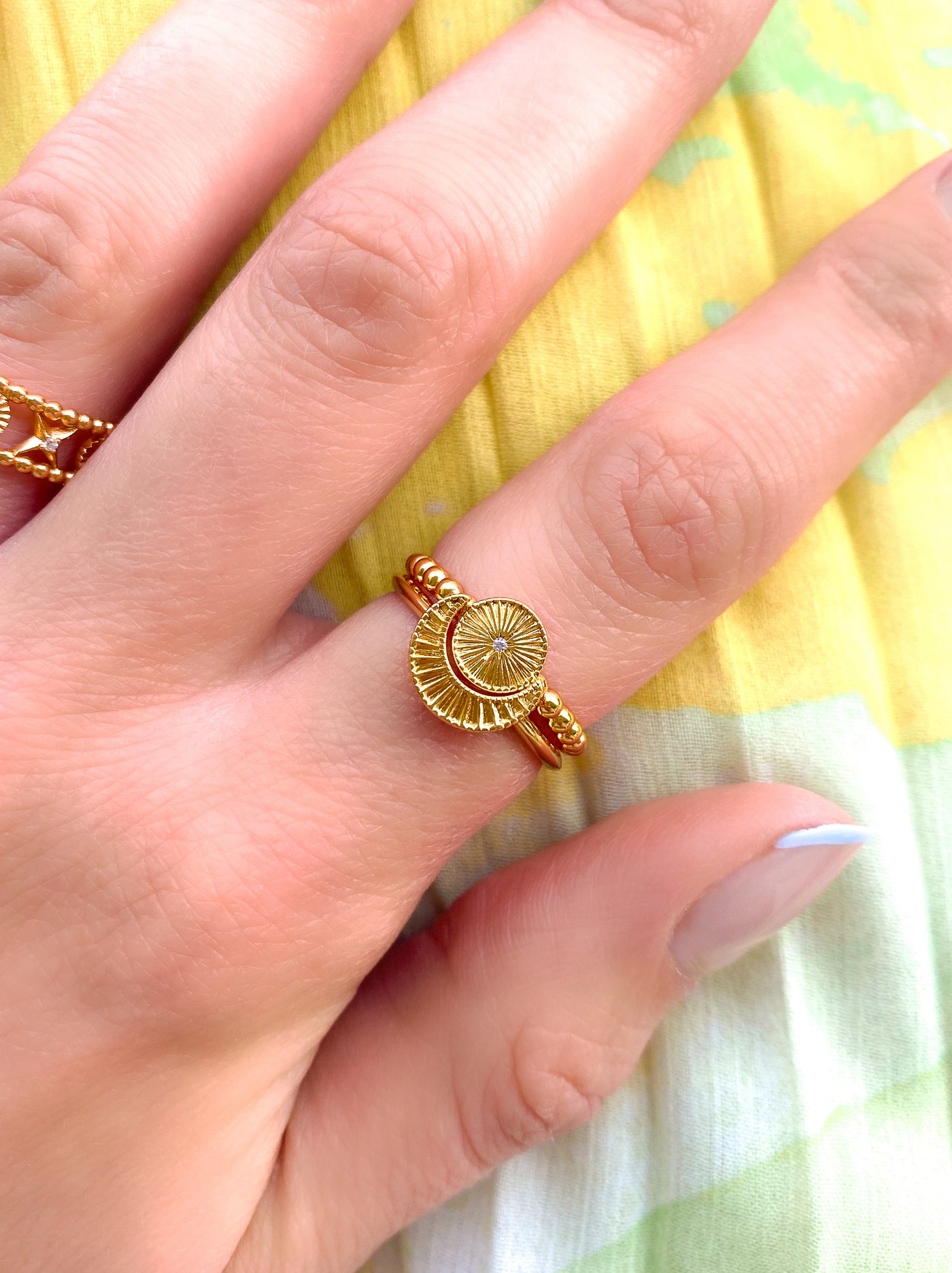 Gold engraved set of 2 sun and moon rings with CZ crystal