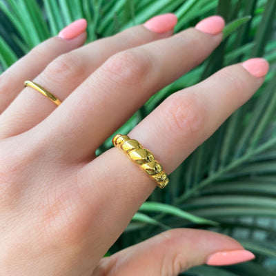 Model wearing gold plated Sterling silver twisted croissant ring 