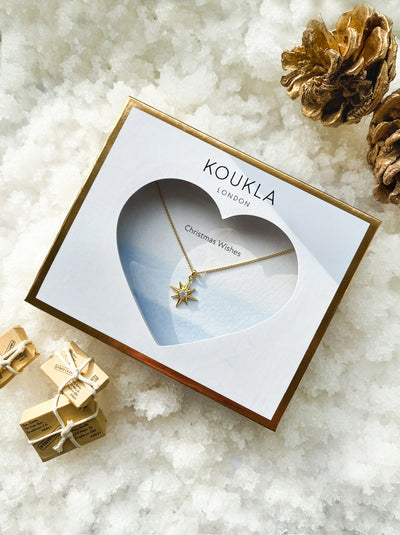 Gold dainty star necklace with CZ crystal secret santa gift in envelope packaging