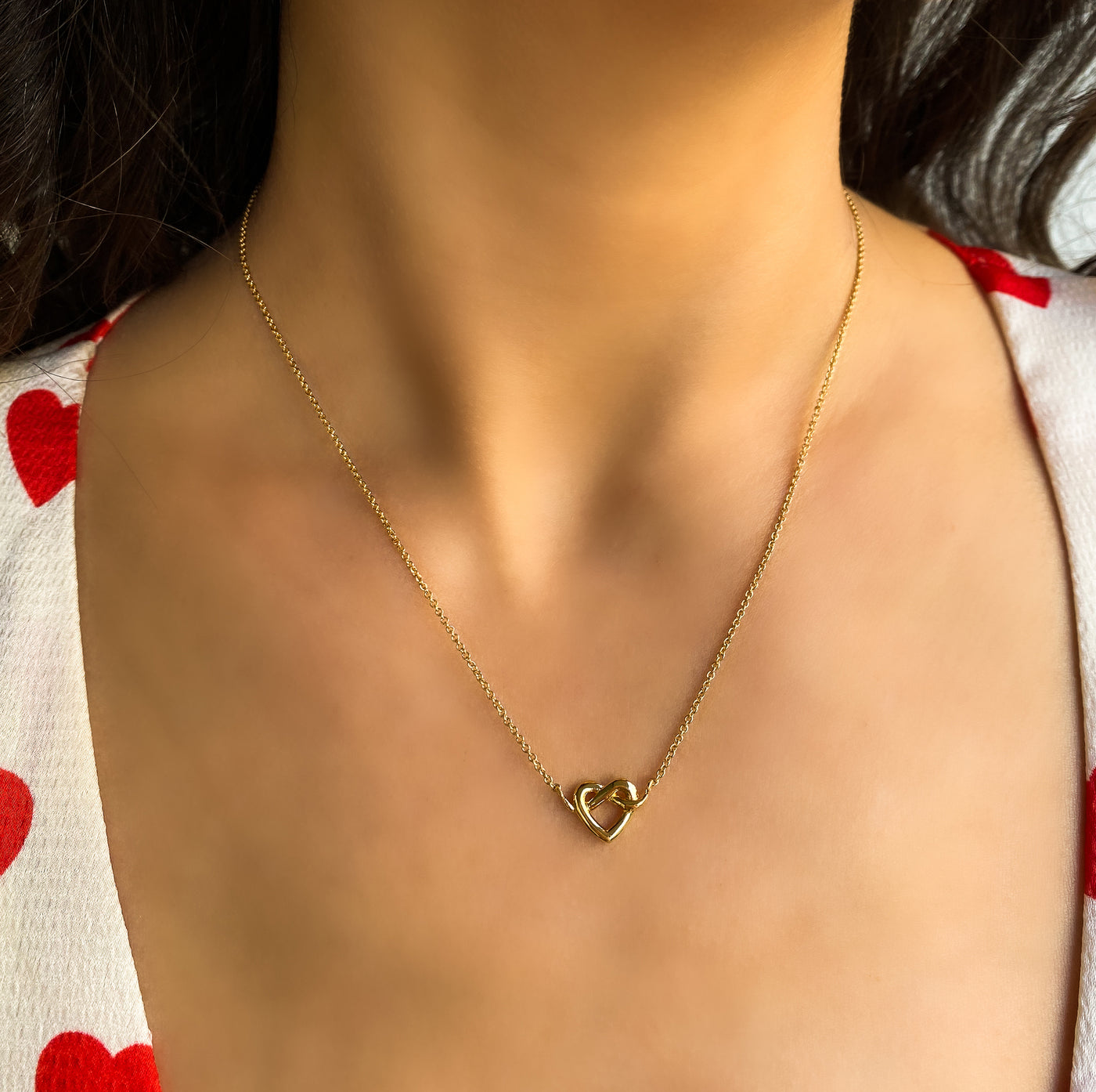 Model wearing Valentines love heart necklace
