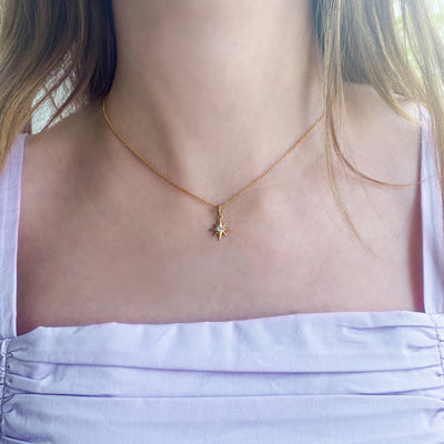 Gold star necklace with CZ crystal 