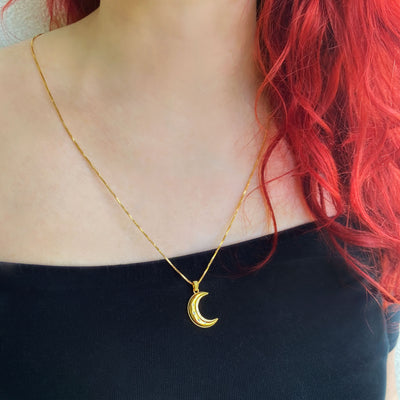 Gold moon pendant necklace on box chain with engraved CZ crystals