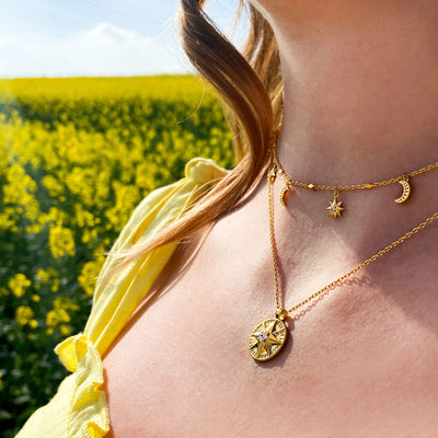 Gold 3D star coin necklace and gold star and moon choker with CZ crystals