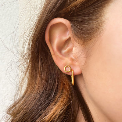 Plain gold circle stud earrings and contemporary rounded rectangle hoops