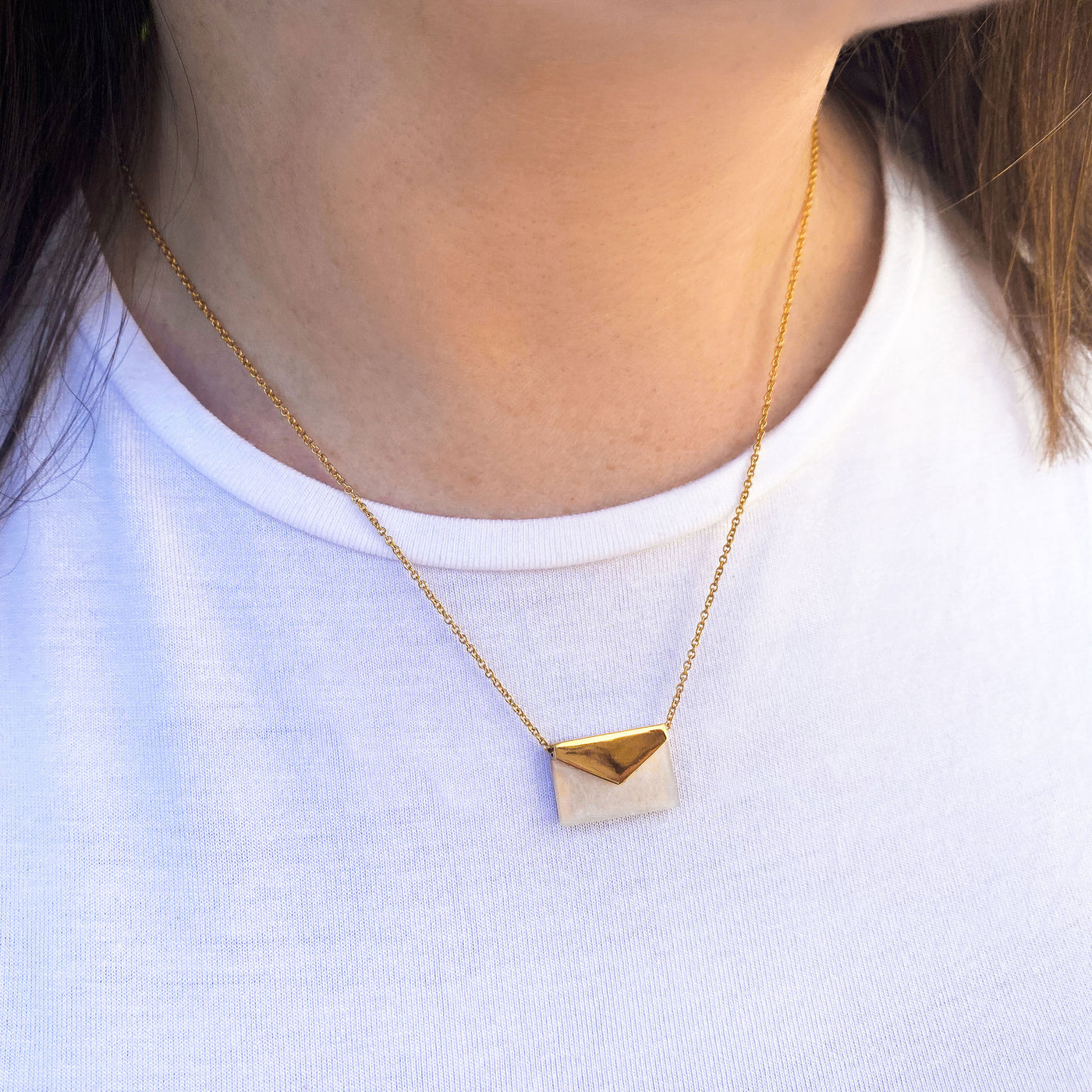 Gold envelope necklace with moonstone