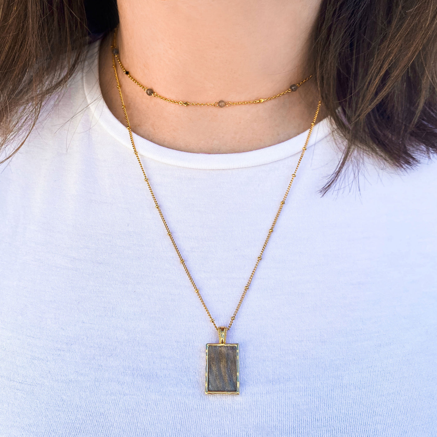Gold layered necklaces with labradorite choker and labradorite rectangle pendant on bobble chain
