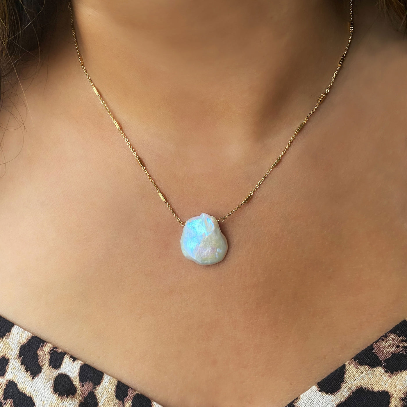 Model wearing gold plated sterling silver freshwater pearl necklace