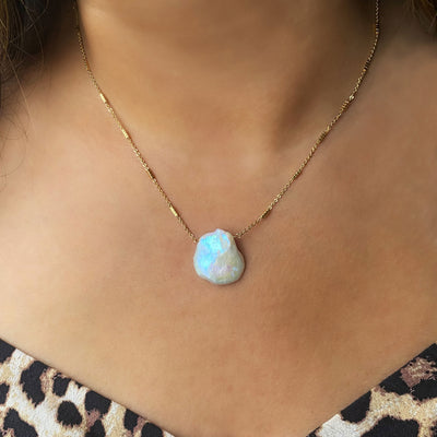 Model wearing gold plated sterling silver freshwater pearl necklace