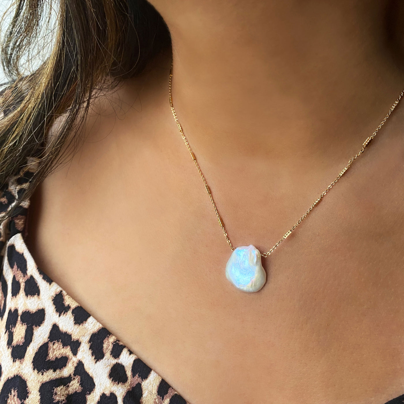 Model wearing gold plated sterling silver freshwater pearl necklace