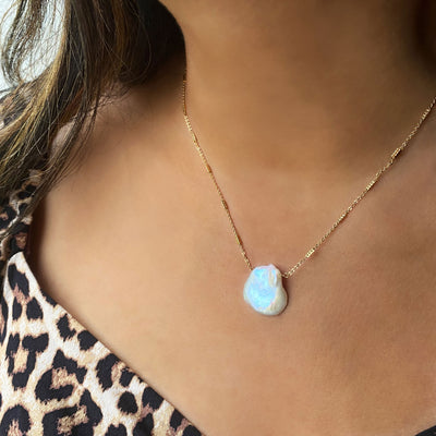 Model wearing gold plated sterling silver freshwater pearl necklace