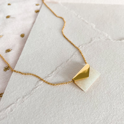 Gold envelope necklace with moonstone